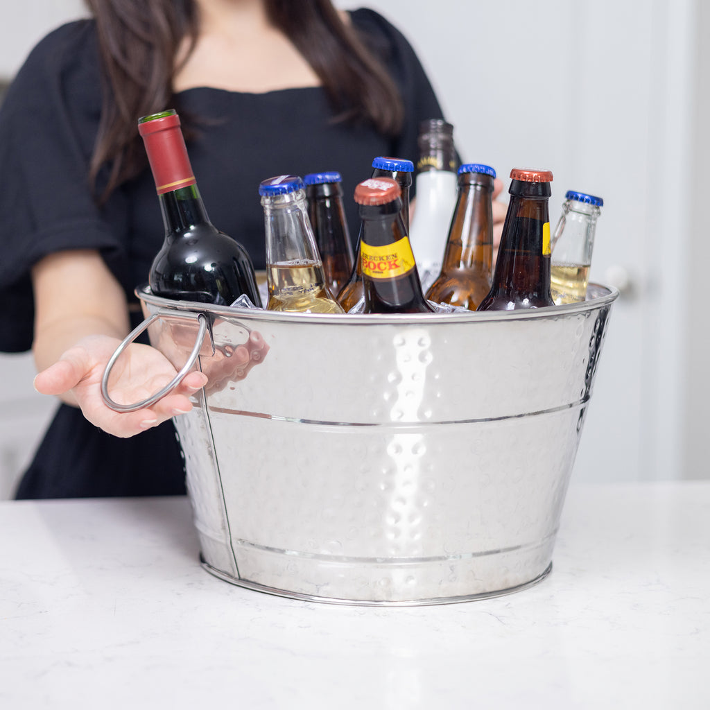 Champagne bucket made of stainless steel that chills wine, champagne, beer, or water for parties.