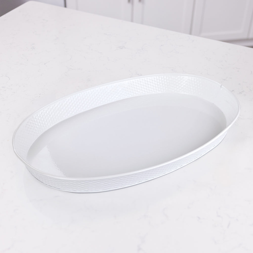 Metal tray in white for drinks or food at parties celebrating a wedding, anniversary, or birthday with friends and family.