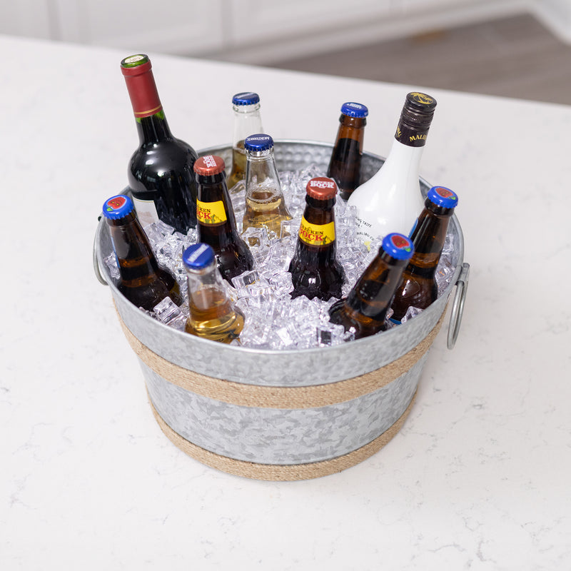 Elevate your gatherings with this galvanized ice bucket, perfect for chilling beer, wine, and champagne. Ideal for home parties, gifting, or as a unique gift basket."