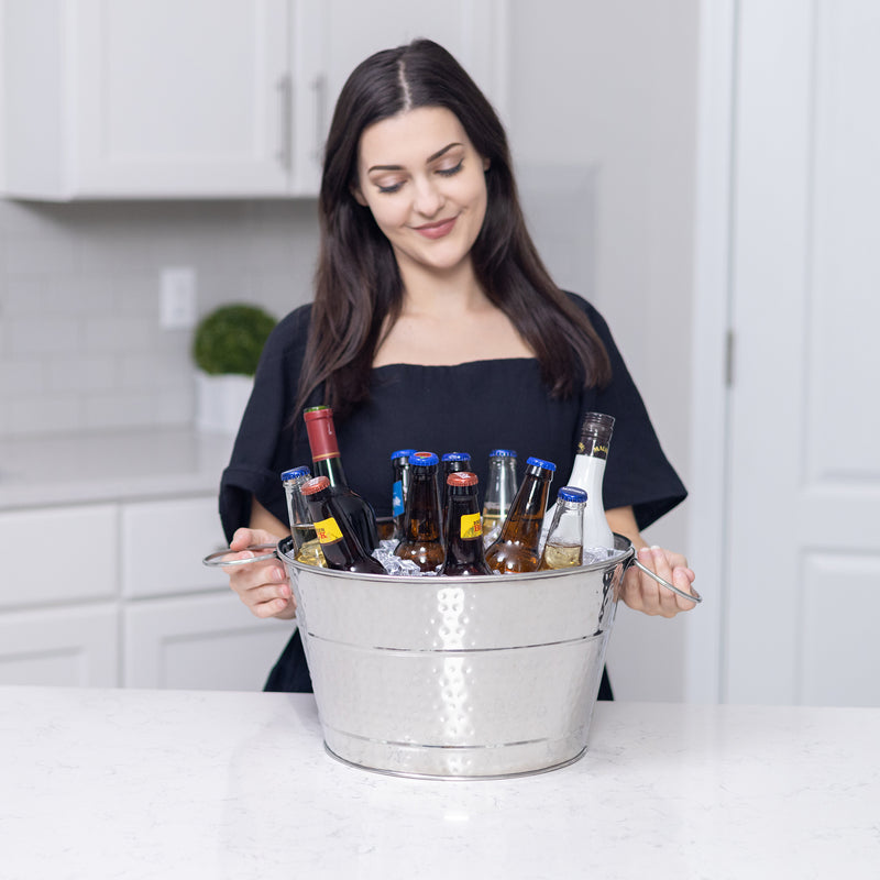 Round large ice bucket for parties to chill drinks when celebrating a wedding, anniversary, or housewarming.
