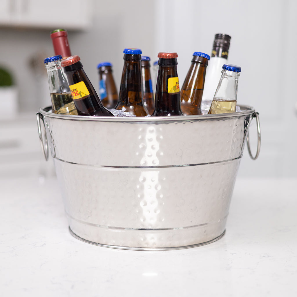 ice bucket for drinks during a party.  Made of stainless steel with hammered exterior.  Keep wine, beer, champagne all cold on ice when celebrating a wedding, housewarming, or anniversary. 