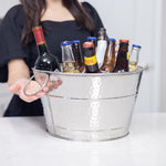 Stainless steel bucket, ice bucket for party to chill drinks.  Use as a champagne bucket, wine bucket, or beer bucket with it's large round 4 gallon bucket size.  Large ice bucket with handles for easy transport.