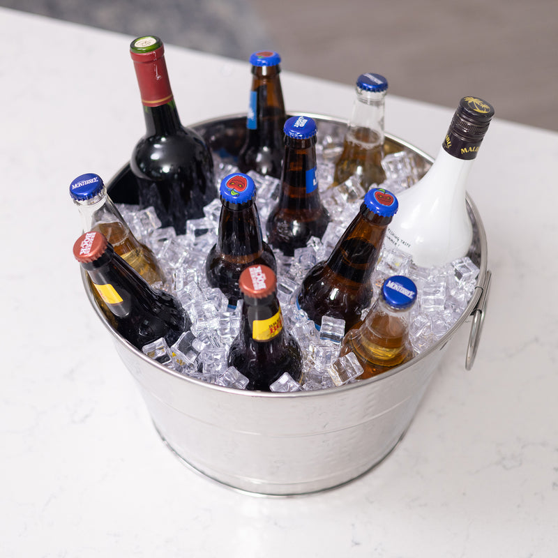 Round metal basket used as an ice bucket for ice or to chill wine or champagne for parties.  