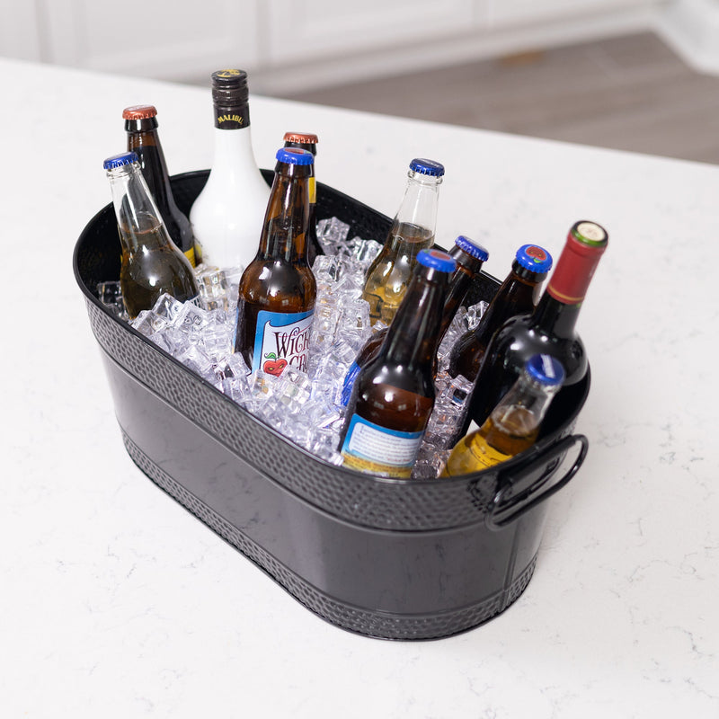 Oval black metal tub for drinks.  Add ice to keep drinks chilled for a party or use as a convenient metal basket for storage.