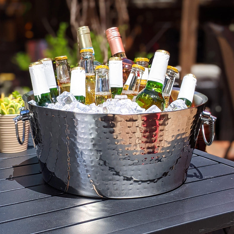 Ice cooler that is insulated and made of stainless steel.  Use as a beer bucket, champagne ice bucket, or wine chiller bucket.  Large round size and handles for easy transport.