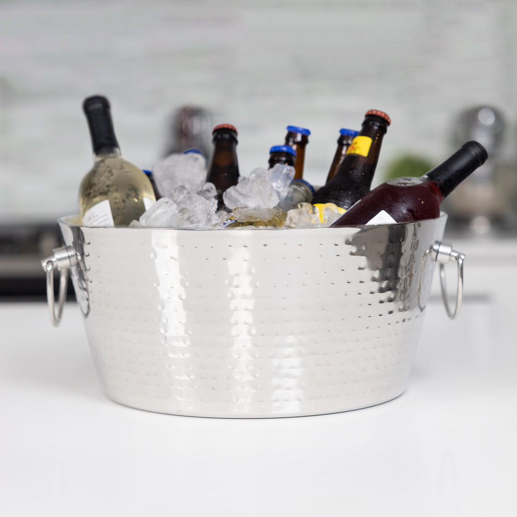 Insulated drink tub for parties for use as a wine bucket or champagne ice bucket.  100% leak proof with strong hinged handles.  Round shape with hammered exterior.