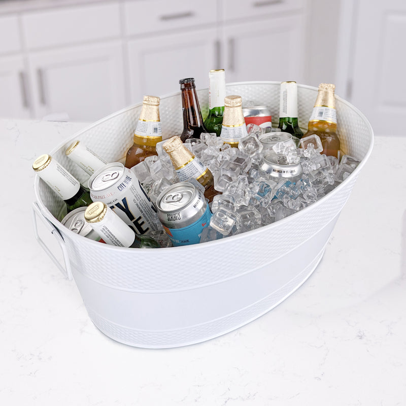 Oval drink tub for ice and beers, wine or other drinks when serving and sharing at a party.  Celebrate with friends and their favorite drinks with this large oval metal drink cooler that is leak resistant and easy to clean.