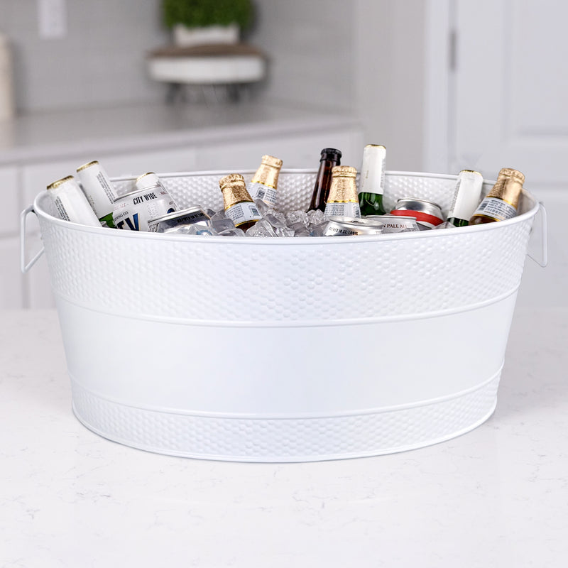 Large white metal drink cooler to chill wine, beer, and other drinks at a party in the home kitchen or on the patio.  Sealed to be leak resistant with durable long lasting hammered exterior.  Great for celebrating a wedding, anniversary, birthday or holiday occasion.