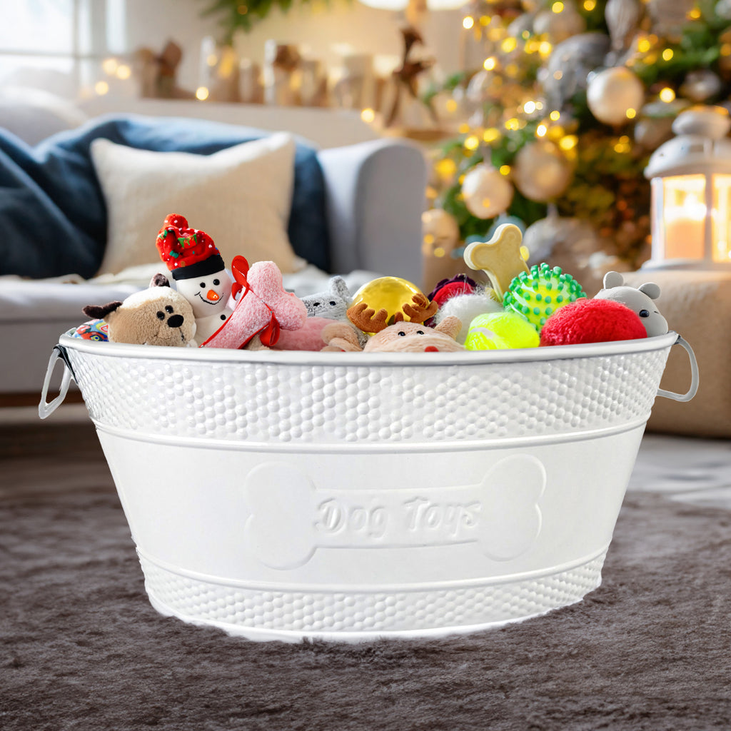 Dog toy container, indestructible made of metal with an easy to clean glossy white finish.  This dog toy holder includes handles for easy transport from room to room.
