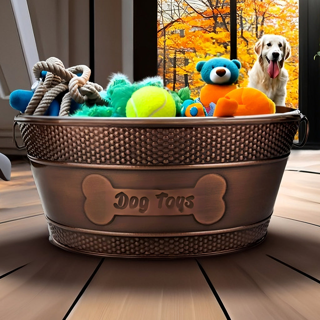 Metal dog toy bin or basket for dog toys ropes, leashes, balls, and treats.  In easy to clean copper color and made of long lasting galvanized steel so your dog cannot destroy this basket.