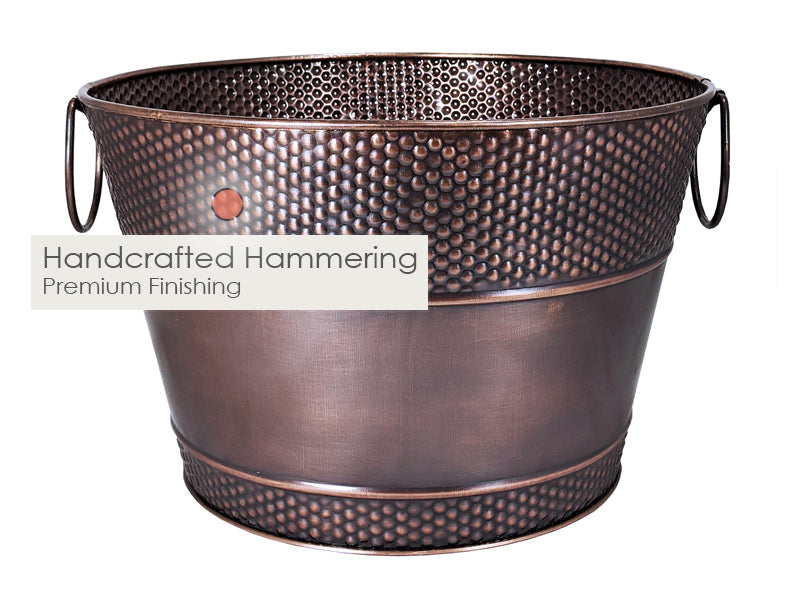 Drink bucket of galvanized metal in antique copper finish with durable handcrafted hammered exterior for long lasting durability.
