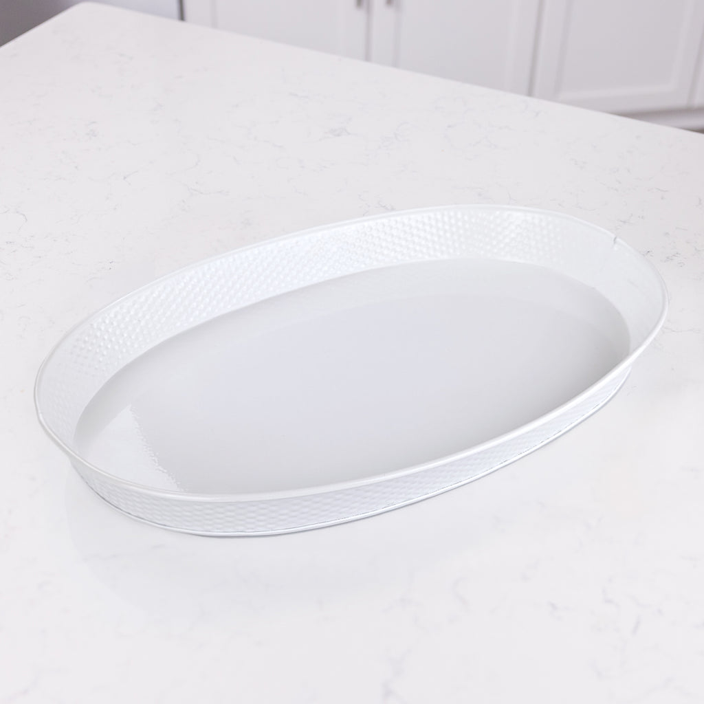 White metal tray for serving food, drinks, or snacks at a party or in the kitchen.