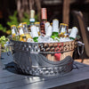 Beverage tub for parties made of stainless steel with mirrored finish that complements any decor, indoors or out on the patio.  Holds and chills wine, beer, champagne, and other drinks in your kitchen, dining room, or bar.
