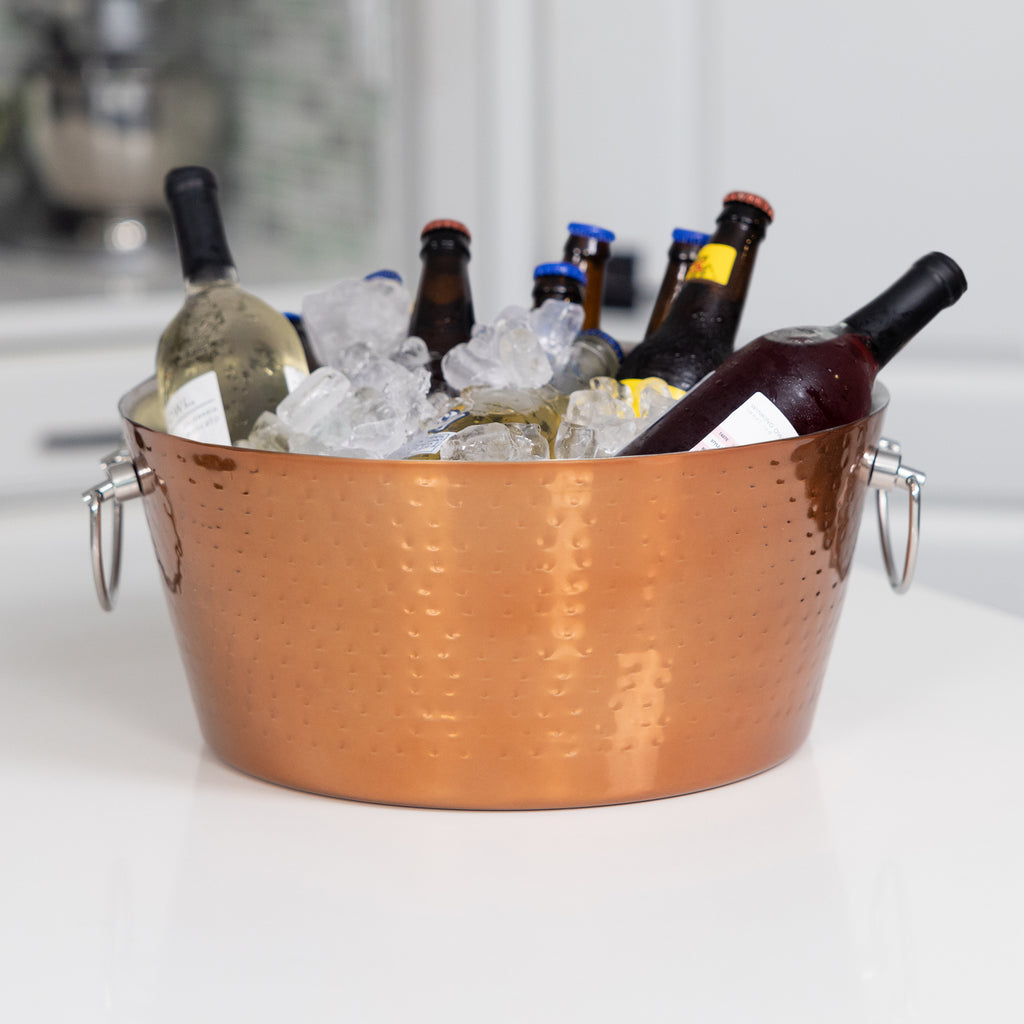 Round insulated ice bucket for parties to chill wine, beer, and water.  100% leak proof for a mess free party experience.  Elegant rose copper glossy finish is perfect for the holiday or celebrating a wedding, anniversary, or housewarming.