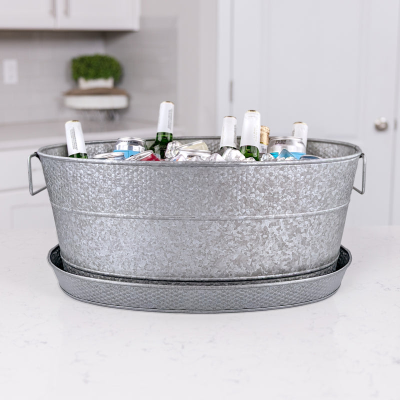 metal serving tray pairs with party drink tub to prevent spills and splashes, protecting tabletop from condensation.  no party tub sweat mess on tables with this metal tray and large beverage tub.