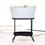 Beverage tub with stand for chilling drinks at a party.  Chill beer, wine, or champagne in this white bucket cooler.