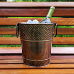 Wine bucket to hold wine or champagne.  Made of premium galvanized metal with an elegant hammered exterior and glossy finish.  Extra durable and sealed to prevent leaking.  Holds 1 or 2 bottles of wine.