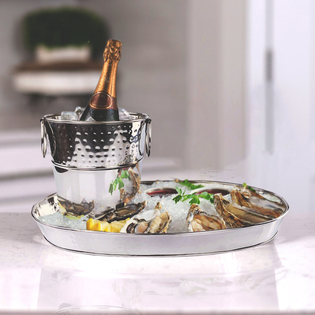 Champagne oyster bucket serves oysters with bottle of champagne.  Add ice to chill the champagne and the oysters.  For kitchen, bar, or patio.  Use in home or in a restaurant.