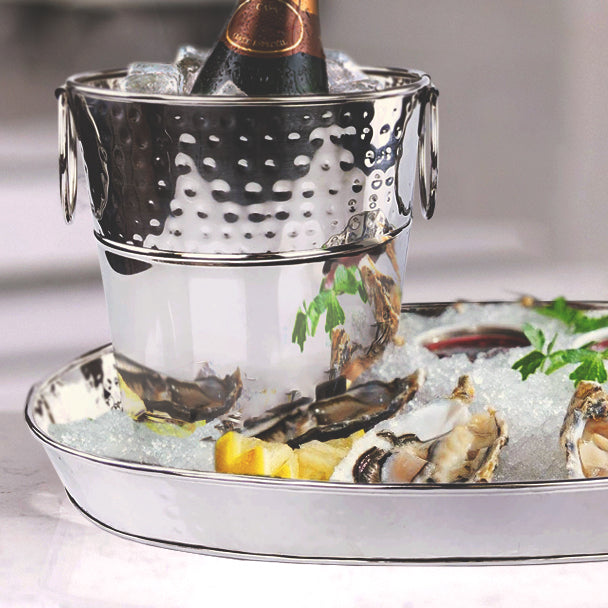Champagne bucket and oyster tray set made of stainless steel.  Food safe and easy to clean.  Use in your kitchen, bar or patio to service oysters with champagne.  Great for in home or restaurant use.  Serve at parties like New Year's Eve or anniversary parties.