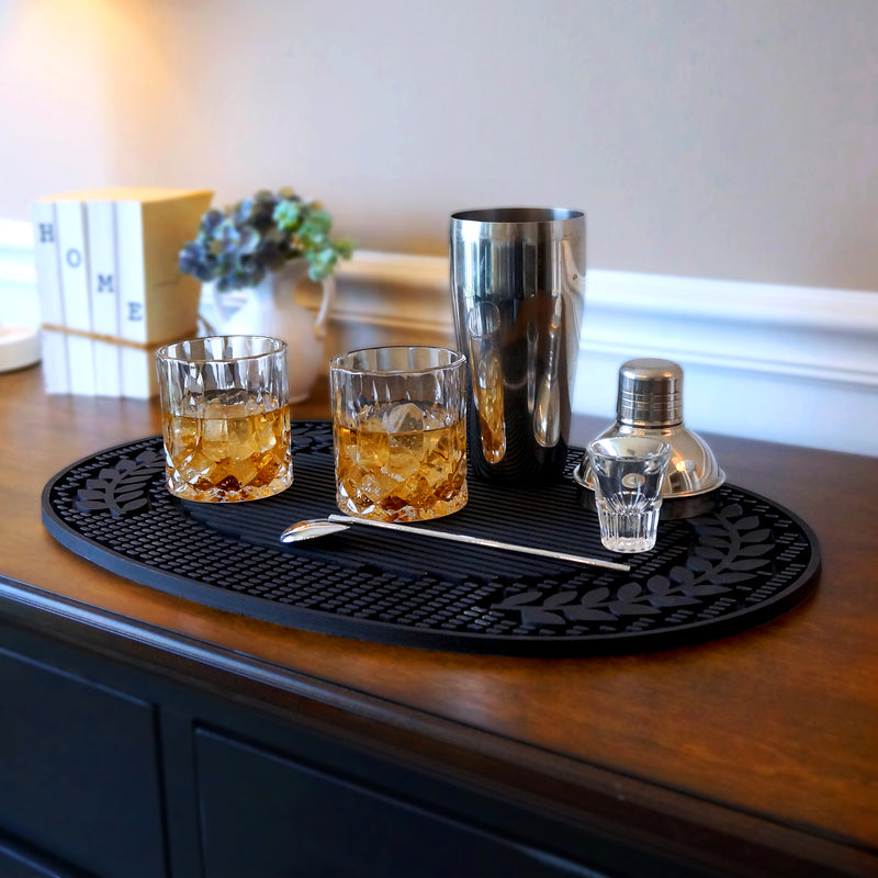 Bar, kitchen, or drying mat made of thick rubber to catch drips and spills.  Protects your tabletop surfaces while complementing your home with it's elegant and unique design.